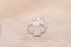 Oval Cut Diamond Three Stone With Hidden Halo Solitaire Ring