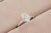 Oval Cut Diamond With Flower Shaped Basket Solitaire Ring