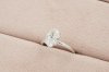 Oval Cut Diamond With Flower Shaped Basket Solitaire Ring