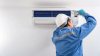 Teknisi BREEZO berseragam biru sedang membersihkan AC dinding — servis AC profesional terpercaya di Semarang. Teknisi BREEZO berseragam biru sedang membersihkan AC dinding — servis AC profesional terpercaya di Semarang.