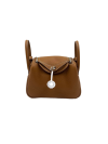 HERMÈS Mini Lindy shoulder bag in Gold Taurillon Clemence leather with Palladium hardware
