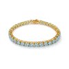 Sterling Silver Sky Blue Topaz Round 5 mm Bracelet Over 18K Yellow Gold Plated 7.25 Inches