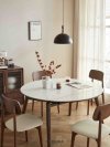 Molly Extendable Round Dining Table Set