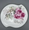 Hand painted Roses- An oval-like porcelain plate with a soft, curved edge