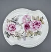 Hand painted Roses- An oval-like porcelain plate with a soft, curved edge