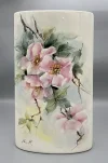 A flat-shaped vase with a wild rose motif