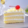 Fresh milk cake with white chocolate topping