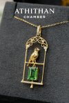 THE JEWEL KEEPER : Resting in Golden Cage Tsavorite Pendant
