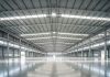 ผลงานรับสร้างโรงงานขนาดใหญ่ โครงสร้างหลังคาเหล็กสูงโปร่ง พื้นคอนกรีตขัดมัน