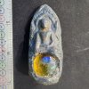 พระลือโขงสองหน้าเนื้อชิน บนเม็ดพระธาตุ กรุดอยไซ
