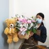 Pink flower basket with bear