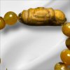 สร้อยประคำข้อมือหยกเหลืองสมเด็จม้วน กรุวังหน้า สมเด็จโตปลุกเสก 2411 (เส้นละ)