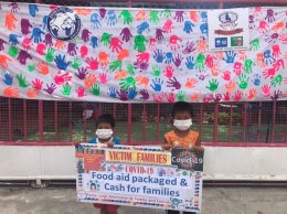 100 Food aid packaged and cash for families