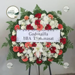 พวงหรีดดอกไม้สดโทนสีแดงส้ม จัดส่งรวดเร็วถึงศาลาวัดพระนอน สุพรรณบุรี