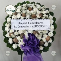 พวงหรีดดอกไม้สดจัดแต่งอย่างประณีต โทนสีสุภาพ บริการจัดส่งพวงหรีดวัดหน่อพุทธางกูร