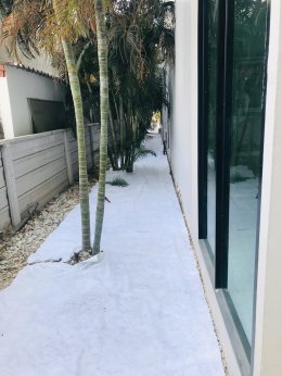 ปรับปรุงสนามหญ้าและสวนโรงแรม หน้างาน บางแสน