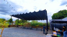 Mechanic Home ผู้ออกแบบ ผลิตและติดตั้ง หลังคาเลื่อนผ้าใบ