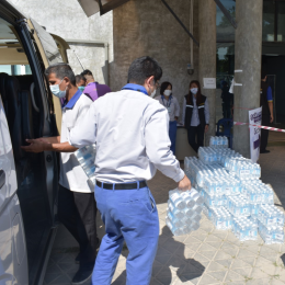 Rayong Factory Donate Drinking water to the vaccination center