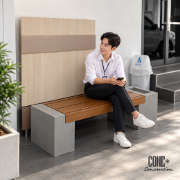 ม้านั่งปูนซีเมนต์ CONC Concreation พร้อมช่องด้านข้างสำหรับวางที่เขี่ยบุหรี่ จัดวางในพื้นที่สูบบุหรี่กลางแจ้ง