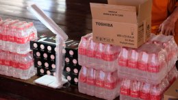 Thai Toshiba Lighting Co., Ltd. donated lamps and drinking water to flood-affected temples.