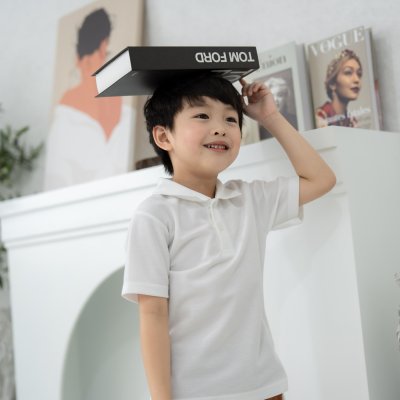 เสื้อโปโลเด็ก สไตล์มินิมอล สีขาว
