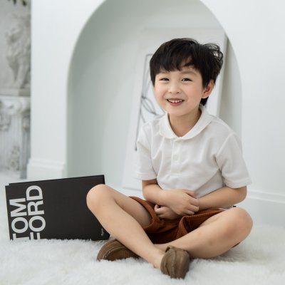 เสื้อโปโลเด็ก สไตล์มินิมอล สีขาว