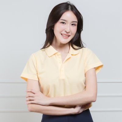 เสื้อโปโลหญิง "ทรงเว้าเอว" สีเหลืองบัตเตอร์