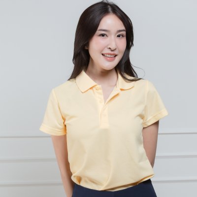 เสื้อโปโลหญิง "ทรงเว้าเอว" สีเหลืองบัตเตอร์
