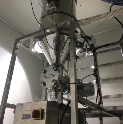 ภาชนะรับผงพร้อมวาล์วโรตารี่