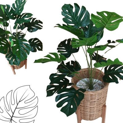 ต้นมอนสเตอร่าปลอมในตะกร้าหวาย ขาตั้งไม้ Artificial monstera plant in a wicker basket, wooden stand
