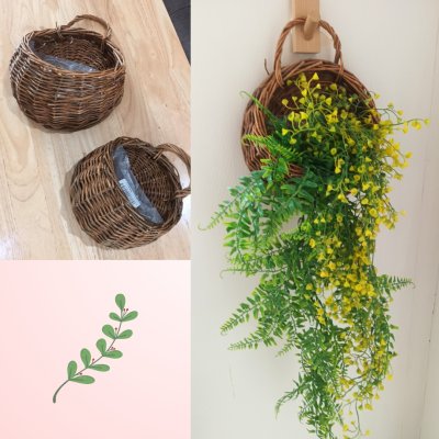 ดอกไม้เลื้อยปลอมดอกไม้ประดิษฐ์ในตะกร้าสานแขวนผนัง Artificial climbing flowers in a woven wall basket.