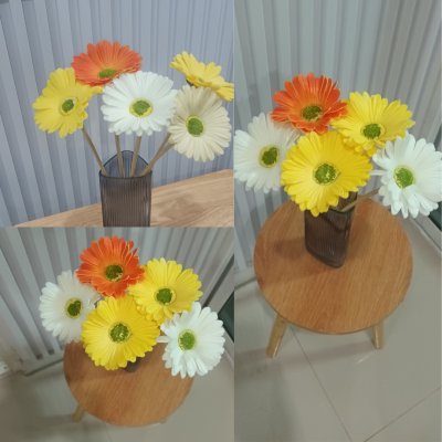 ช่อดอกเยอบีร่าในกระถางเบลล่า 5 นิ้ว ขาตั้งไม้ Gerbera flower bouquet in a 5-inch Bella pot.