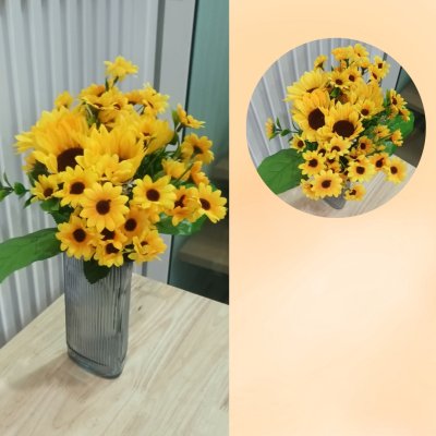 อดอกทานตะวันปลอมประดิษฐ์แจกันแก้ว Artificial sunflowers in a glass vase.