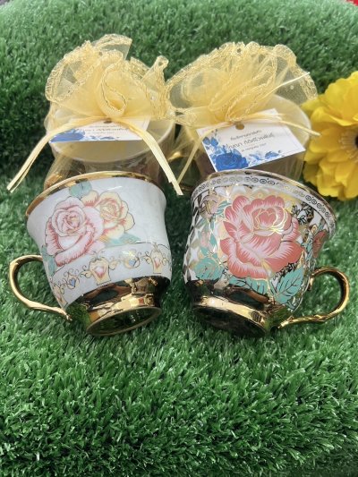 ของชำร่วยงานศพแก้วชาลายดอกไม้ขอบทองพร้อมถุงไหม