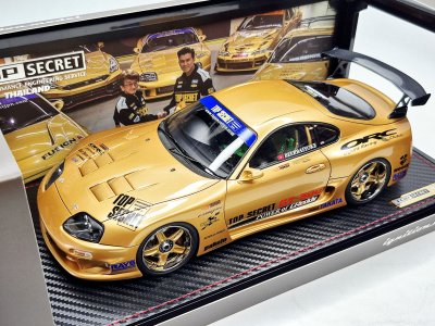 Toyota Supra GT300 (A80) Gold + Figure Mr. Nagata D