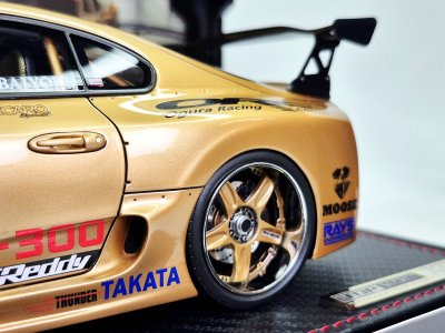 Toyota Supra GT300 (A80) Gold + Figure Mr. Nagata D