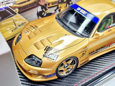 Toyota Supra GT300 (A80) Gold + Figure Mr. Nagata D