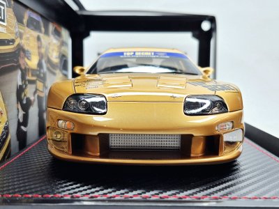 Toyota Supra GT300 (A80) Gold + Figure Mr. Nagata D