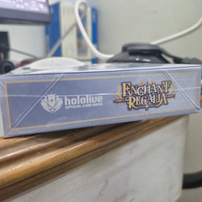 [EN] hololive OFFICIAL CARD GAME Booster Pack – Enchant Regalia - กล่องสุ่มการ์ด 12 ซอง(ภาษาอังกฤษ)