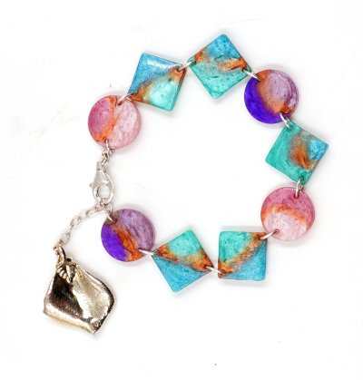 Resin bracelet with real flower charm.