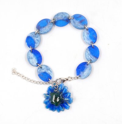 Resin bracelet with real flower charm.
