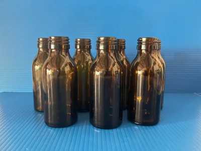 ขวดปอนด์ สีชา 100ml ฝาดำ+จุกใน (144/Box)