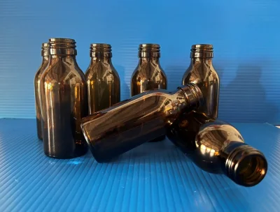 ขวดปอนด์ สีชา 100ml ฝาดำ+จุกใน (144/Box)