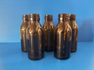 ขวดปอนด์ สีชา 100ml ฝาดำ+จุกใน (144/Box)