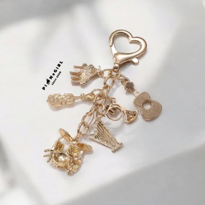 Heart Ring Keychain with Dangling Musical Instrument