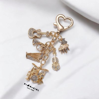 Heart Ring Keychain with Dangling Musical Instrument