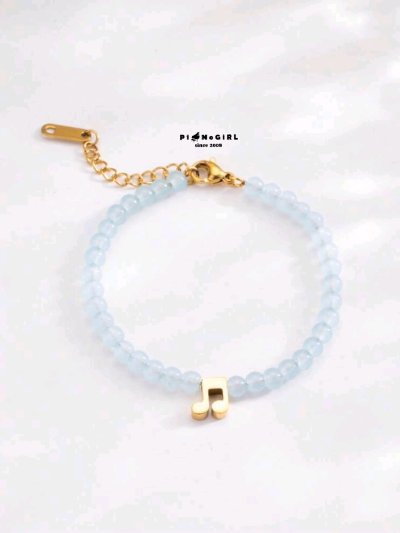 สร้อยข้อมือลูกปัดสีฟ้าตัวเขบ็จ