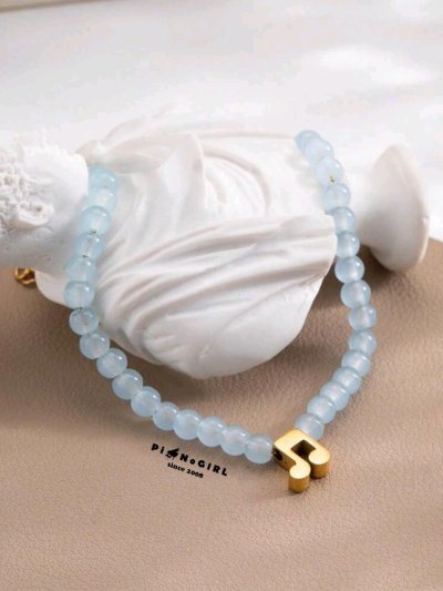 สร้อยข้อมือลูกปัดสีฟ้าตัวเขบ็จ