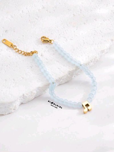 สร้อยข้อมือลูกปัดสีฟ้าตัวเขบ็จ