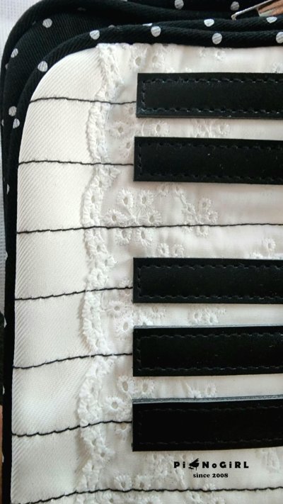 Piano-Themed Shoulder Bag with Adorable Details